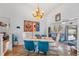 Spacious dining area with hardwood floors and view of the pool at 8692 Vesta Ter, Orlando, FL 32825