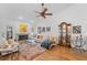 Bright living room with hardwood floors, fireplace and a view to dining room at 8692 Vesta Ter, Orlando, FL 32825