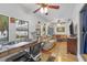 Relaxing Gathering room with comfortable seating, a desk area, and backyard access at 8692 Vesta Ter, Orlando, FL 32825