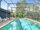 Refreshing screened pool with brick pavers at 1469 Grace Lake Cir, Longwood, FL 32750