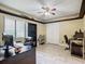 Home office with a desk, chair, and built-in shelving at 1469 Grace Lake Cir, Longwood, FL 32750