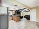 Open kitchen with stainless steel appliances and view of living room at 1469 Grace Lake Cir, Longwood, FL 32750