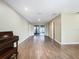 Bright living room featuring tile floors and access to backyard at 1469 Grace Lake Cir, Longwood, FL 32750