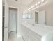 Double vanity bathroom with white cabinets and quartz countertop at 1018 Norwood Dr, Deltona, FL 32725