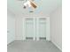 Bedroom with double closets and ceiling fan at 1018 Norwood Dr, Deltona, FL 32725