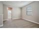 Spacious bedroom with neutral carpeting and large window at 11944 Bracco St, Winter Garden, FL 34787