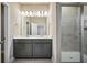 Modern bathroom with double vanity and shower at 11960 Bracco St, Winter Garden, FL 34787