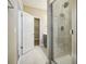 Clean bathroom with shower and closet access at 11960 Bracco St, Winter Garden, FL 34787