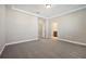 Large bedroom with access to a full bath at 11960 Bracco St, Winter Garden, FL 34787