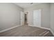 Spacious bedroom with neutral walls and carpeting, offering access to other rooms at 11960 Bracco St, Winter Garden, FL 34787