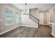 Dining room with wood-look floors and neutral walls at 11960 Bracco St, Winter Garden, FL 34787