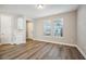 Dining area with wood-look flooring and neutral walls at 11960 Bracco St, Winter Garden, FL 34787