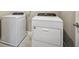 Laundry room with side-by-side washer and dryer at 11960 Bracco St, Winter Garden, FL 34787