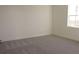 Bright bedroom with carpeted flooring and neutral-colored walls at 14569 Crestavista Dr, Clermont, FL 34714