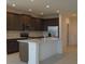 Modern kitchen with stainless steel appliances and island at 14569 Crestavista Dr, Clermont, FL 34714