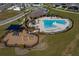 Community pool and playground with adjacent homes visible at 14569 Crestavista Dr, Clermont, FL 34714