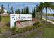 Ridgeview community entrance sign with festive holiday decor at 14569 Crestavista Dr, Clermont, FL 34714