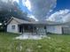 Ranch style home with covered patio and large backyard at 2391 Moonstone Ave, Deltona, FL 32738