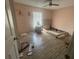 Simple bedroom with light pink walls and wood-look floors at 2391 Moonstone Ave, Deltona, FL 32738