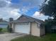 Attached two-car garage with a newly installed roof at 2391 Moonstone Ave, Deltona, FL 32738