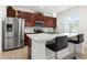 Modern kitchen with stainless steel appliances and an island at 2940 Nottel Dr, Saint Cloud, FL 34772