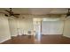 Spacious living room with hardwood floors and ceiling fan at 1722 Wood Violet Dr, Orlando, FL 32824