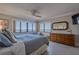 Ocean view bedroom with king-size bed and ample natural light at 5303 S Atlantic Ave # 35, New Smyrna Beach, FL 32169