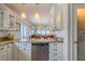 Modern kitchen with granite countertops and stainless steel appliances at 5303 S Atlantic Ave # 35, New Smyrna Beach, FL 32169