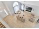 Living room with vaulted ceiling and tile floor, seen from an elevated viewpoint at 2362 Albion Ave, Orlando, FL 32833