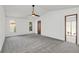 Main bedroom with grey carpet and access to private patio at 7904 Dunstable Cir, Orlando, FL 32817