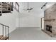 Spacious living room with spiral staircase and brick fireplace at 7904 Dunstable Cir, Orlando, FL 32817