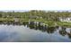 Peaceful lakefront property with lush vegetation at 5625 Chipola Cir, Orlando, FL 32839