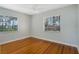 Bright bedroom with hardwood floors and large windows at 5625 Chipola Cir, Orlando, FL 32839