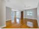 Hardwood floors and ceiling fan in spacious living room at 5625 Chipola Cir, Orlando, FL 32839