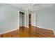 Bedroom with hardwood floors and built-in closet at 5625 Chipola Cir, Orlando, FL 32839