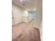 Upstairs hallway with carpeted floor at 420 Quarry Rock Cir, Kissimmee, FL 34758