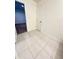 Small bathroom with tile flooring and linen closet at 420 Quarry Rock Cir, Kissimmee, FL 34758