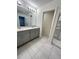 Modern bathroom with double vanity and separate shower at 420 Quarry Rock Cir, Kissimmee, FL 34758