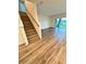 Spacious living room with hardwood floors and access to backyard at 420 Quarry Rock Cir, Kissimmee, FL 34758