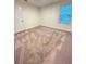 Spacious bedroom with neutral carpeting at 420 Quarry Rock Cir, Kissimmee, FL 34758
