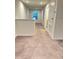 Clean hallway with carpet and bathroom access at 420 Quarry Rock Cir, Kissimmee, FL 34758