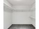 Spacious walk-in closet with ample shelving and hanging space at 7904 Dunstable Cir, Orlando, FL 32817