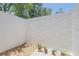 Private patio with gravel and potted plants, perfect for relaxing outdoors at 7904 Dunstable Cir, Orlando, FL 32817