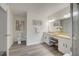 Bathroom boasts double sinks, granite counters, and a walk-in shower at 812 Shell Ln, Longwood, FL 32750