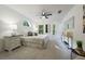 Bright bedroom featuring a king-size bed and a ceiling fan at 812 Shell Ln, Longwood, FL 32750