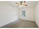 Bright bedroom featuring a ceiling fan and a window with blinds at 812 Shell Ln, Longwood, FL 32750