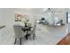 Kitchen boasts granite countertops, white cabinets, and stainless steel appliances at 812 Shell Ln, Longwood, FL 32750