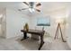 Home office with a large desk, comfortable chair, and natural light at 812 Shell Ln, Longwood, FL 32750