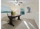 Bright home office features a large desk and window with natural light at 812 Shell Ln, Longwood, FL 32750