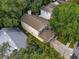 Aerial view of house, driveway, and surrounding trees at 812 Shell Ln, Longwood, FL 32750